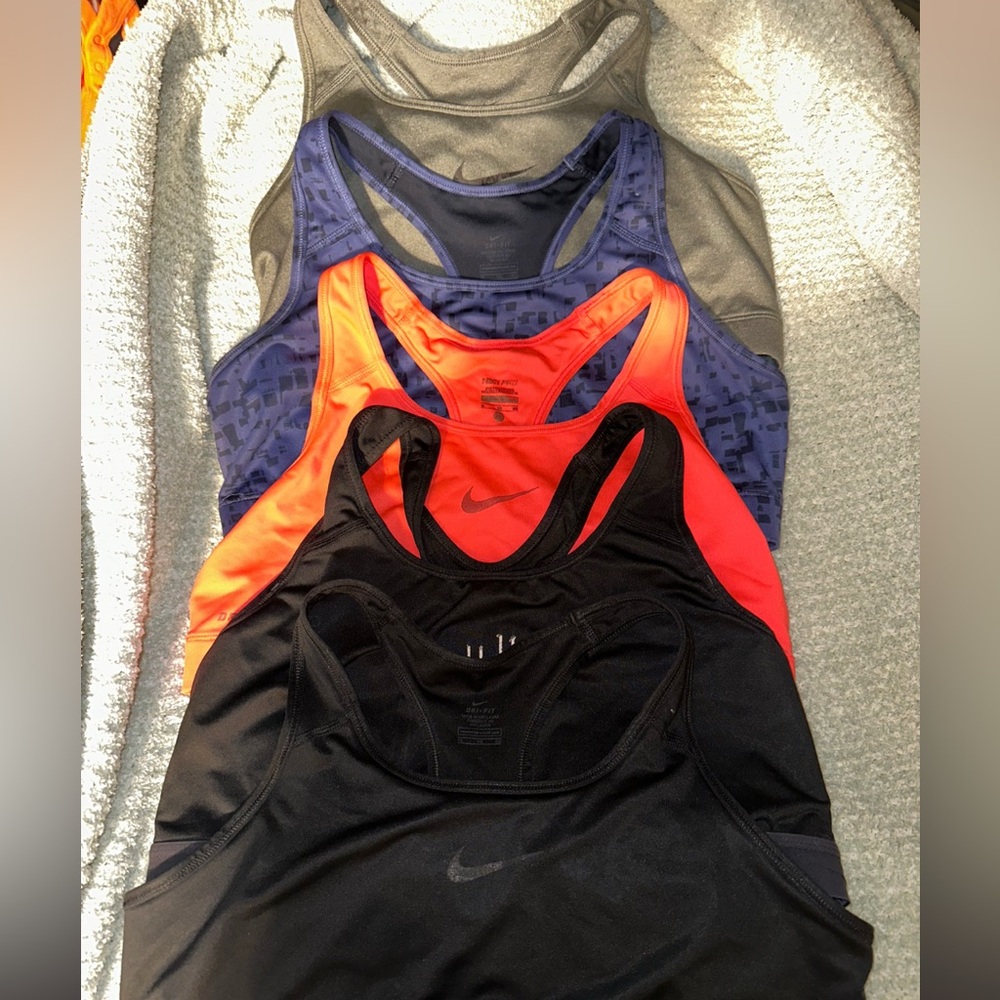 Nike Women's Racerback Tank Tops in Black, Orange, and Blue